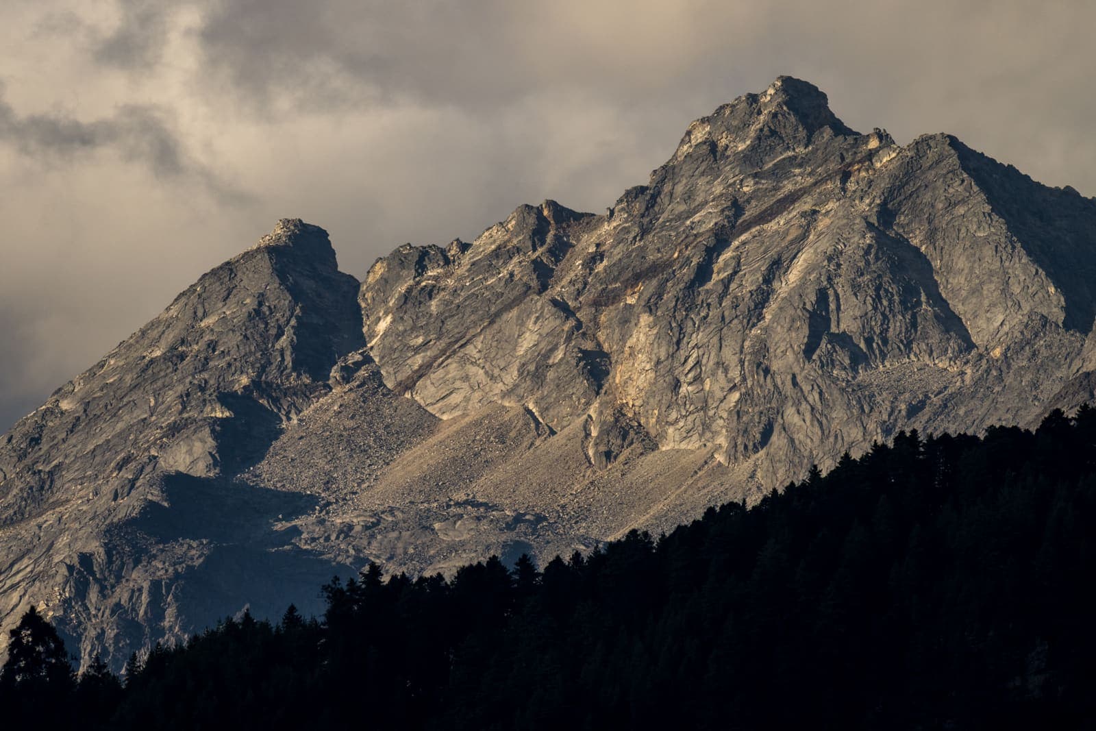 A rugged snow-dusted peak above Paro