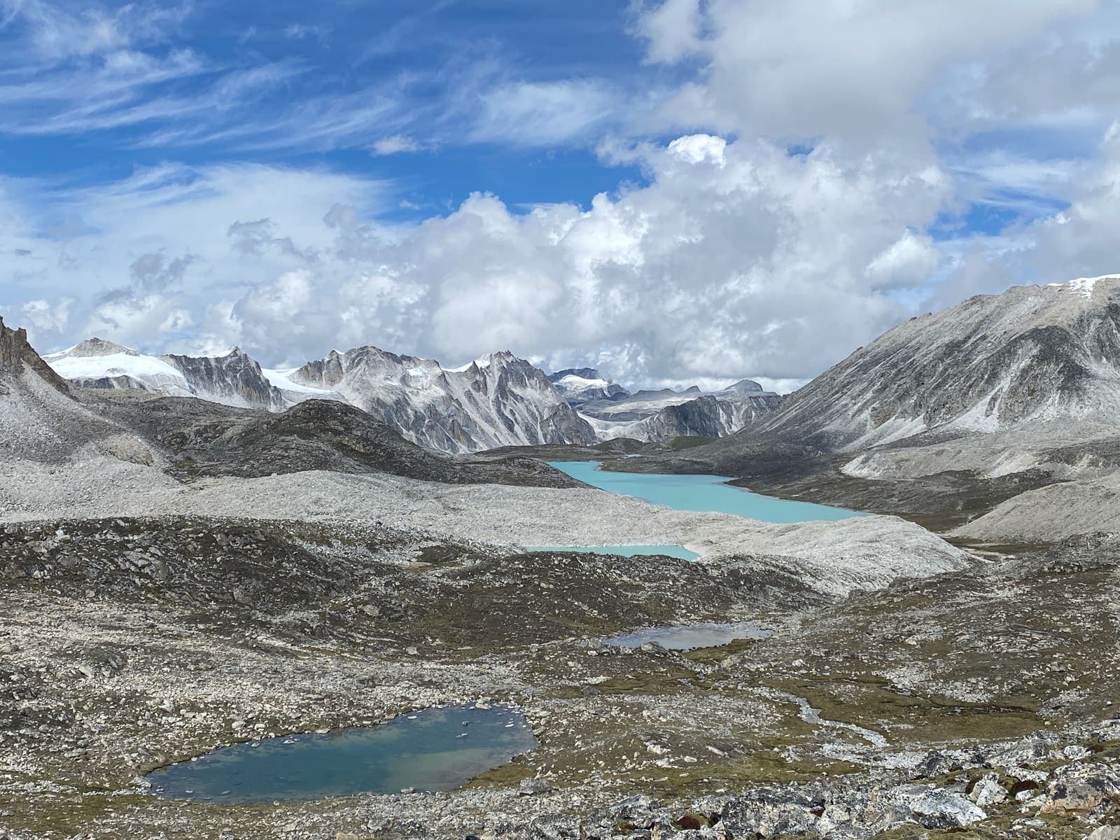A glacial lake and mountain ridges seen while trekking